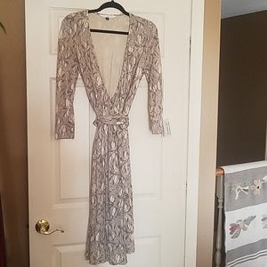 Diane Von Furstenberg wrap dress; 100% silk